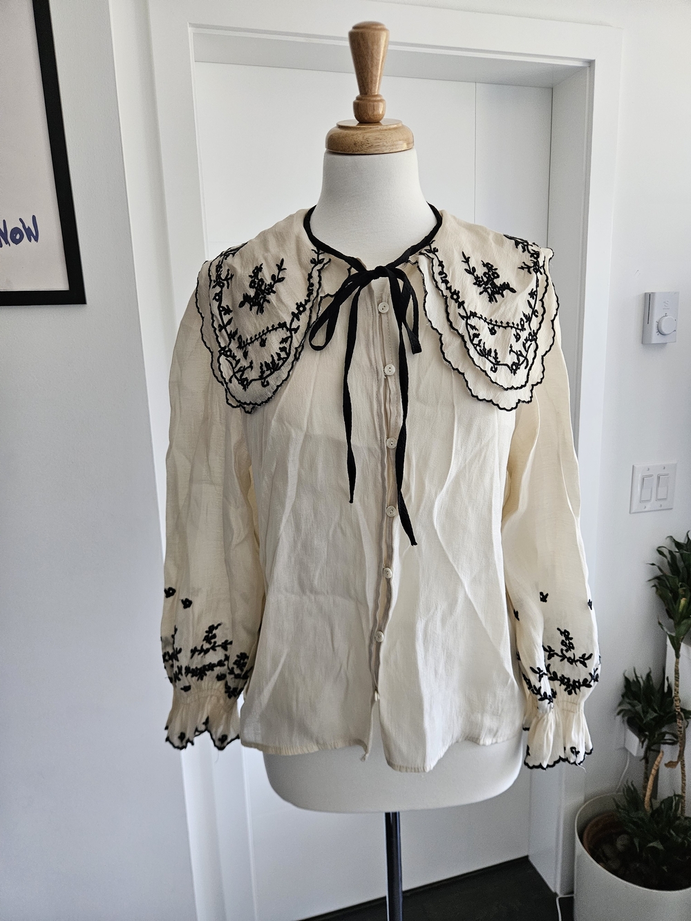 Ivory Embroidered Tie-Neck Blouse with Black Trim
